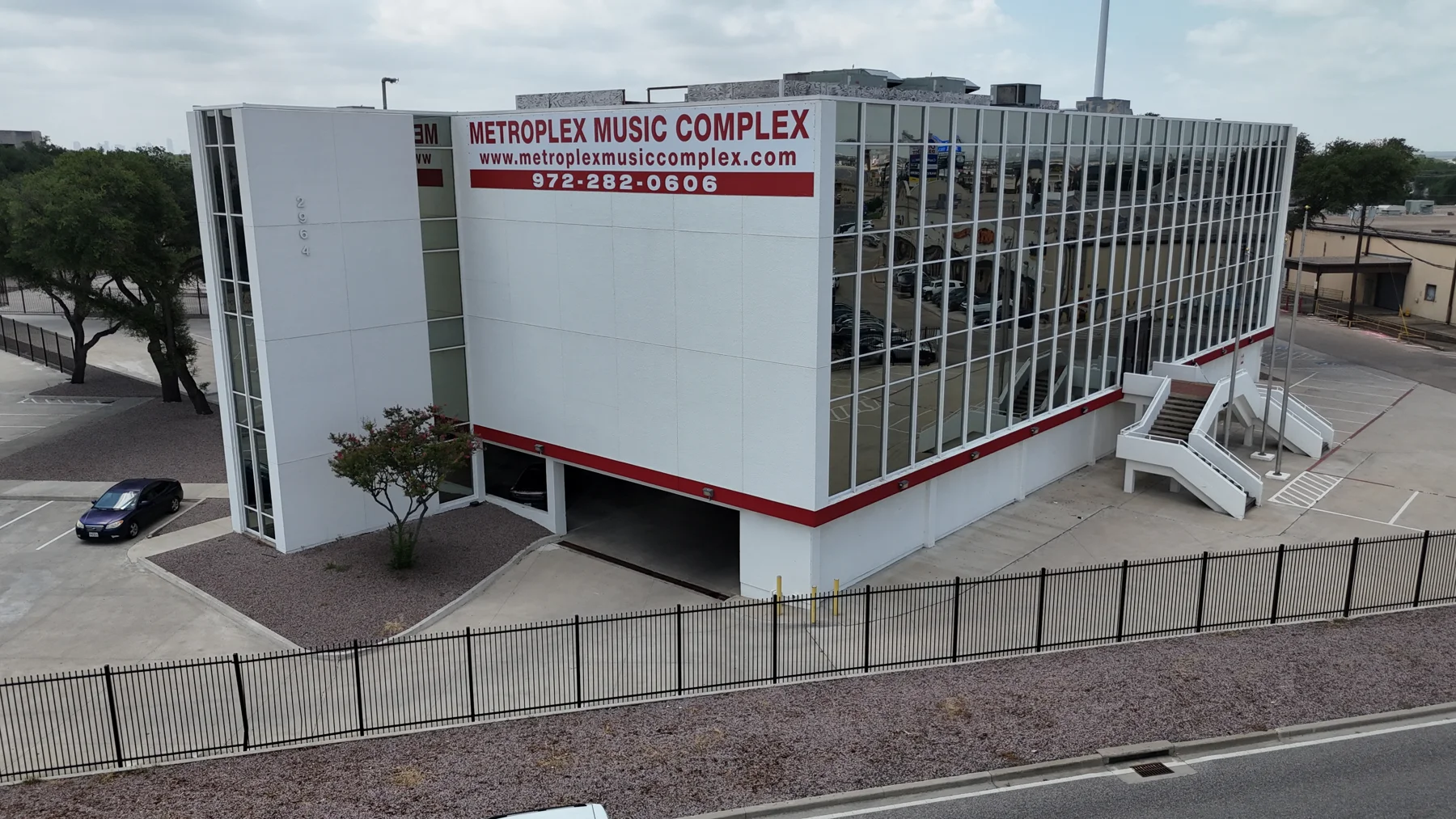 Metroplex Music Complex building and entrance on LBJ Freeway in Dallas